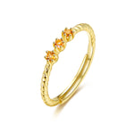 Lamorvita_3SpessartiteGarnet_Twisted_SilverStackableRing_WhiteBackground