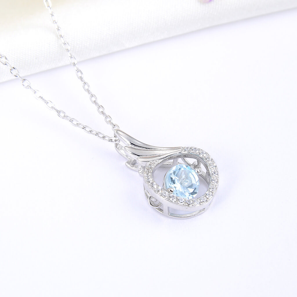 Lamorvita_BlueTopazCubizZirconia_AngelWing_WhiteGoldSilverDancingStonePendantNecklace_LeftScene