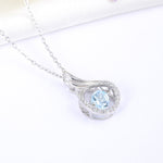 Lamorvita_BlueTopazCubizZirconia_AngelWing_WhiteGoldSilverDancingStonePendantNecklace_LeftScene