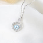 Lamorvita_BlueTopazCubizZirconia_AngelWing_WhiteGoldSilverDancingStonePendantNecklace_RightScene