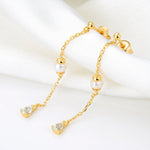 Lamorvita_PearlBlueTopaz_ThreadDangle_SilverStudEarrings_RightScene