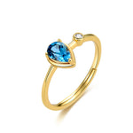 Lamorvita_SwissBlueTopaz_PearShaped_SilverRing_WhiteBackground